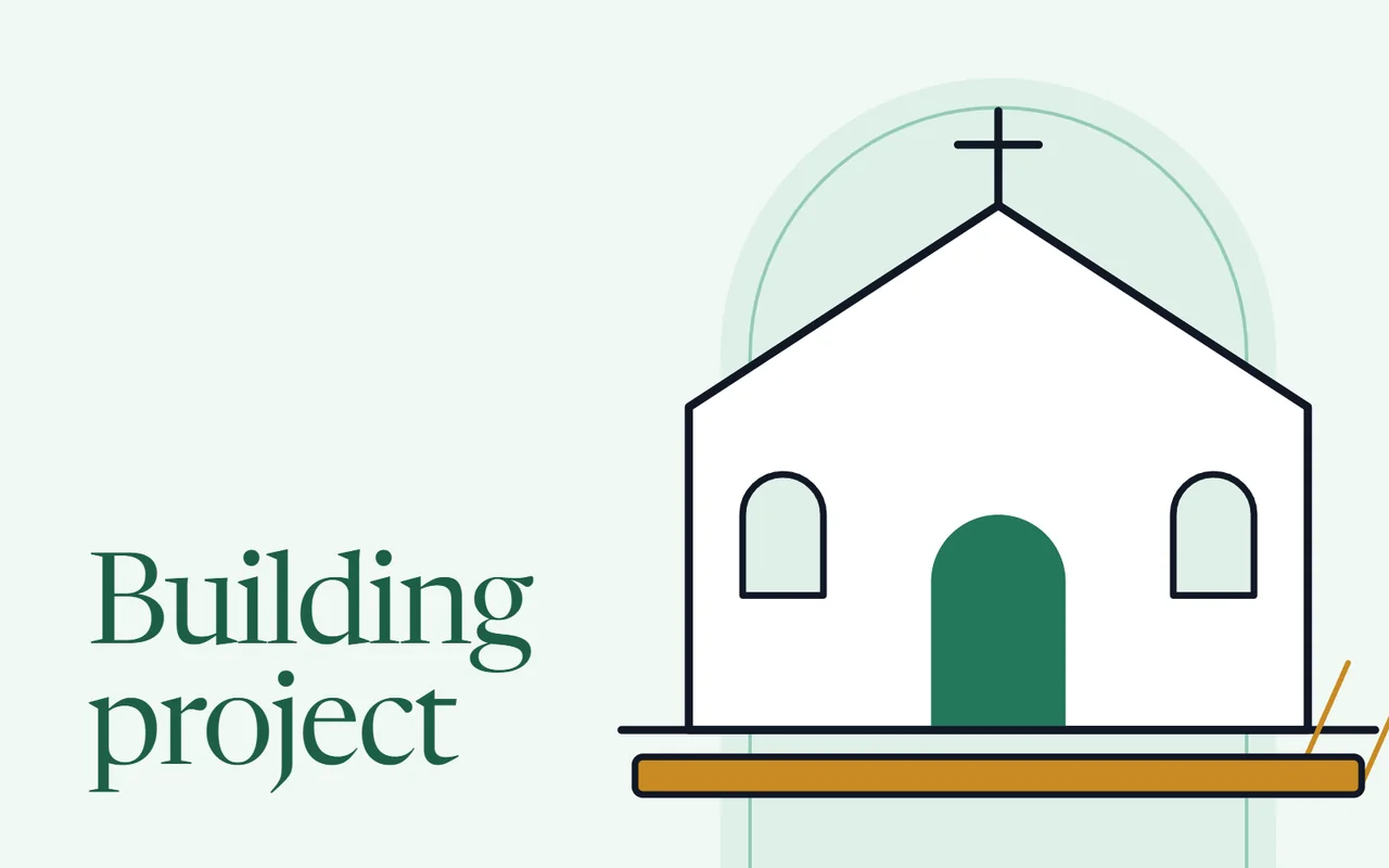 A church building with an arched door and a ruler along the base